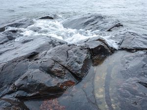 Preview wallpaper rock, stone, water, waves, sea