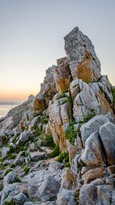 Preview wallpaper rock, stones, grass, sea, nature