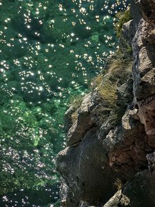 Preview wallpaper rock, stones, sea, relief, glare
