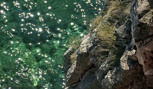 Preview wallpaper rock, stones, sea, relief, glare