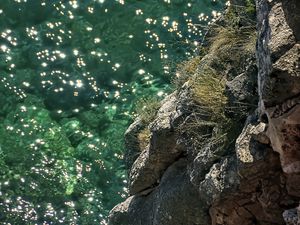 Preview wallpaper rock, stones, sea, relief, glare