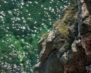 Preview wallpaper rock, stones, sea, relief, glare