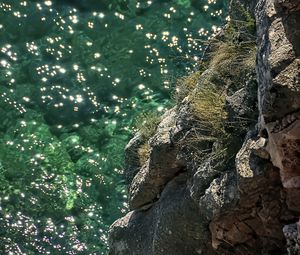 Preview wallpaper rock, stones, sea, relief, glare