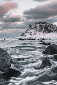 Preview wallpaper rock, stones, waves, snow, shore