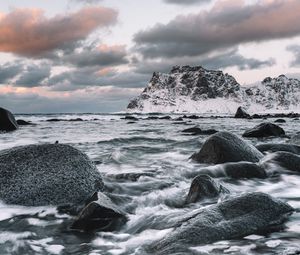 Preview wallpaper rock, stones, waves, snow, shore