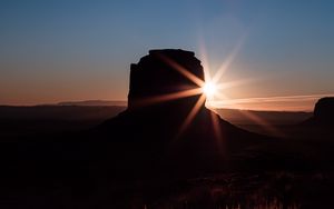 Preview wallpaper rock, sun, sunset, dark, landscape