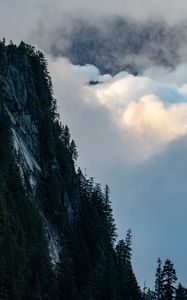 Preview wallpaper rock, trees, clouds, mountain, peak