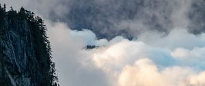 Preview wallpaper rock, trees, clouds, mountain, peak