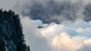 Preview wallpaper rock, trees, clouds, mountain, peak