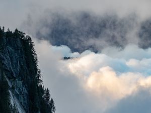 Preview wallpaper rock, trees, clouds, mountain, peak