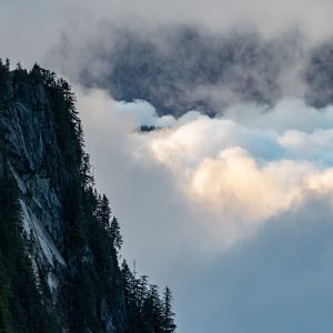 Preview wallpaper rock, trees, clouds, mountain, peak