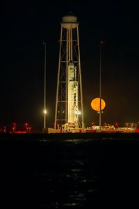 Preview wallpaper rocket, construction, night, moon