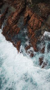 Preview wallpaper rocks, aerial view, sea, foam