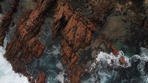 Preview wallpaper rocks, aerial view, sea, foam