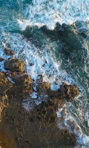 Preview wallpaper rocks, aerial view, sea, foam, stones