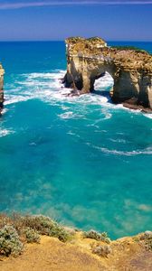 Preview wallpaper rocks, arches, coast, australia, blue water