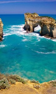 Preview wallpaper rocks, arches, coast, australia, blue water