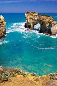 Preview wallpaper rocks, arches, coast, australia, blue water