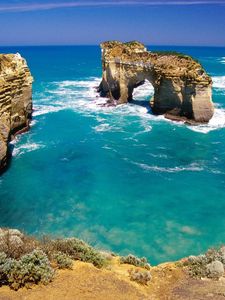 Preview wallpaper rocks, arches, coast, australia, blue water