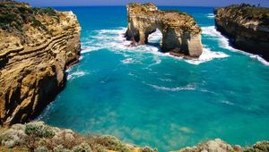 Preview wallpaper rocks, arches, coast, australia, blue water