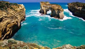 Preview wallpaper rocks, arches, coast, australia, blue water