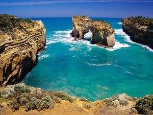 Preview wallpaper rocks, arches, coast, australia, blue water