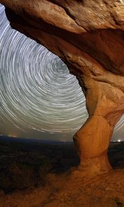 Preview wallpaper rocks, canyon, stars, long exposure, rotation, night