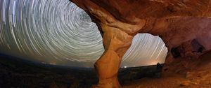 Preview wallpaper rocks, canyon, stars, long exposure, rotation, night