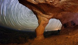 Preview wallpaper rocks, canyon, stars, long exposure, rotation, night