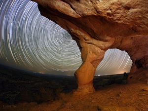 Preview wallpaper rocks, canyon, stars, long exposure, rotation, night