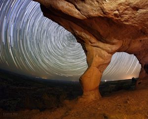 Preview wallpaper rocks, canyon, stars, long exposure, rotation, night