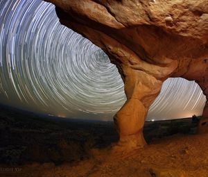 Preview wallpaper rocks, canyon, stars, long exposure, rotation, night