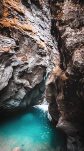 Preview wallpaper rocks, cave, gorge, body of water, water, nature