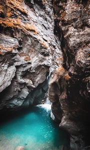 Preview wallpaper rocks, cave, gorge, body of water, water, nature