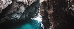 Preview wallpaper rocks, cave, gorge, body of water, water, nature