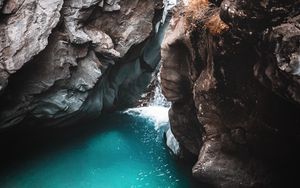 Preview wallpaper rocks, cave, gorge, body of water, water, nature