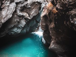 Preview wallpaper rocks, cave, gorge, body of water, water, nature