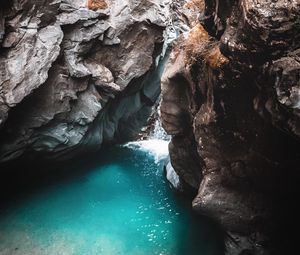 Preview wallpaper rocks, cave, gorge, body of water, water, nature