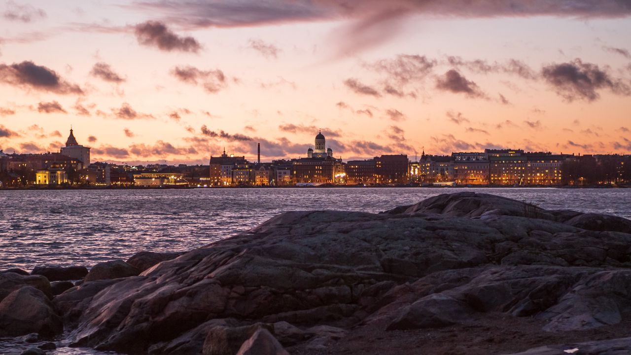 Wallpaper rocks, city, buildings, sea, sky
