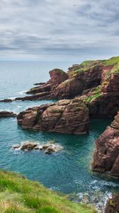 Preview wallpaper rocks, cliff, sea, grass
