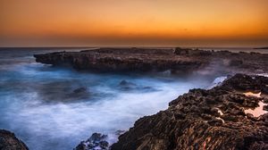Preview wallpaper rocks, cliff, sunset, horizon, fog
