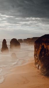 Preview wallpaper rocks, coast, sand, water, waves, aerial view, nature