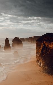 Preview wallpaper rocks, coast, sand, water, waves, aerial view, nature