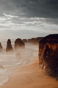 Preview wallpaper rocks, coast, sand, water, waves, aerial view, nature