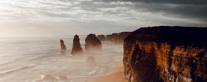 Preview wallpaper rocks, coast, sand, water, waves, aerial view, nature