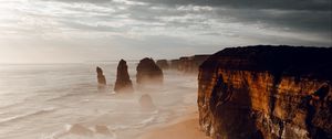 Preview wallpaper rocks, coast, sand, water, waves, aerial view, nature