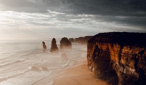Preview wallpaper rocks, coast, sand, water, waves, aerial view, nature