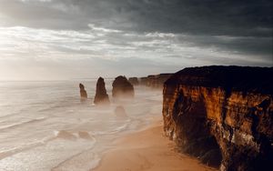 Preview wallpaper rocks, coast, sand, water, waves, aerial view, nature