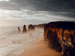 Preview wallpaper rocks, coast, sand, water, waves, aerial view, nature