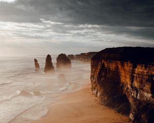 Preview wallpaper rocks, coast, sand, water, waves, aerial view, nature